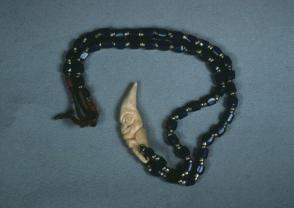 Trade Beads with Carved Bear Tooth