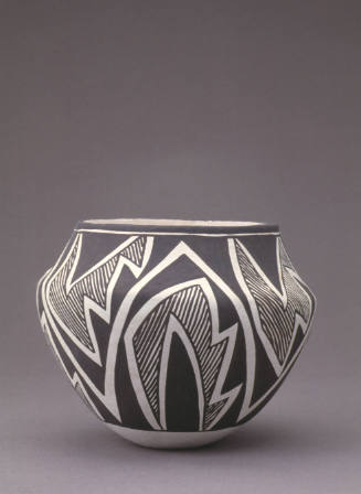 Jar with black and white geometric design