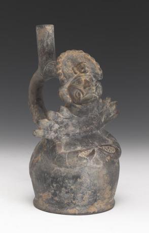 Stirrup spout vessel:  fanged deity with crab body