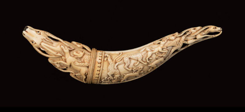 Powder horn with carved animals