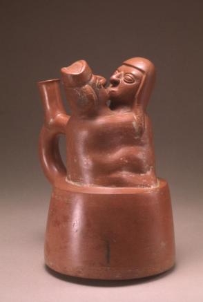 Stirrup cup: kissing couple
