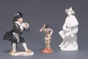 Harlequin playing a musette