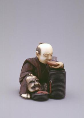 Model of a Seated Kyogen Actor Drinking Sake