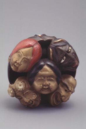 Lacquered Wood Ryusa Netsuke Carved as Nine Noh Masks