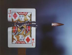 Bullet Shot Through Playing Card