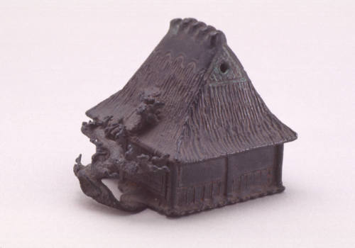 Waterdropper modelled as a farm house