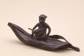 Waterdropper modelled as a monkey atop a leaf
