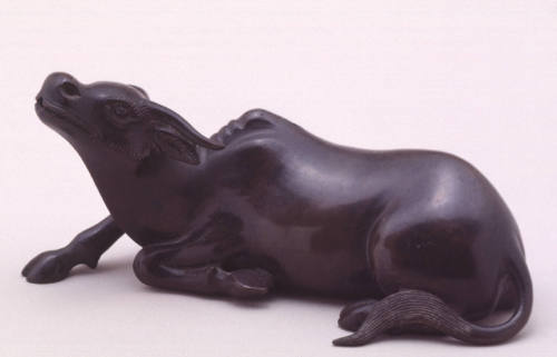 Waterdropper modelled as a reclining bull