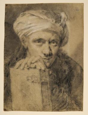 Man Wearing Turban and Holding a Book