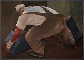 Worker Lifting a Rock