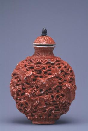 Snuff bottle:  Fu-dogs playing with balls among ribbons