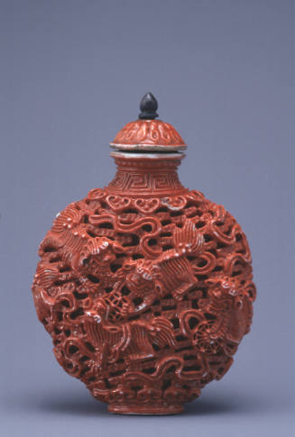 Snuff bottle:  Fu-dogs playing with balls among ribbons