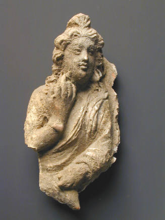 Praying figure fragment