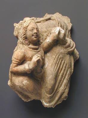 Praying figure fragment