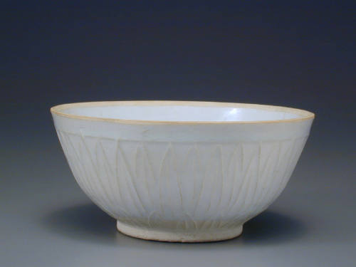 Bowl molded with petal motifs