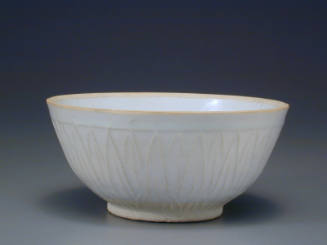 Bowl molded with petal motifs