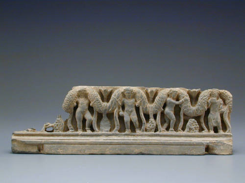 Shist frieze fragment of boys with a garland of flowers