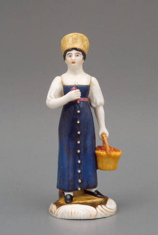 Figure of a woman with fruit basket