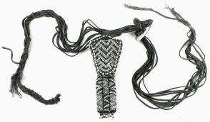 Braided raffia belt with ornament