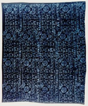 Starch resist cloth (adire eleko) with writing motif