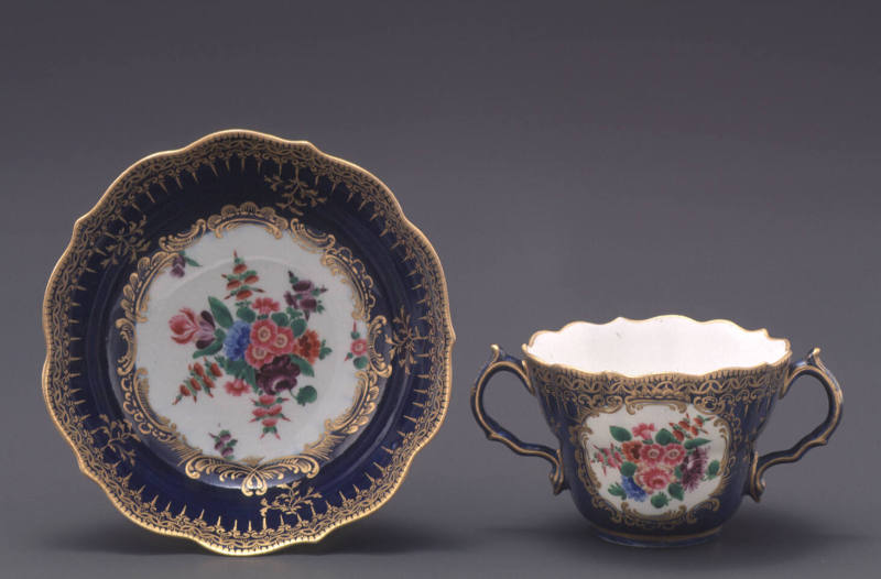 Two-handled cup and saucer