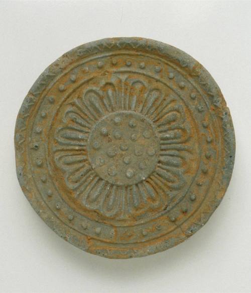 Roof tile end with lotus design