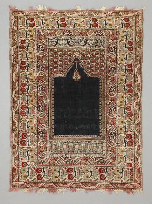 Ghiordes pattern prayer rug