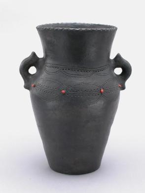 Vessel with Red (Kisi) Seeds