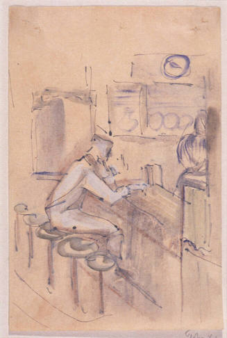 Man Seated on a Stool at a Counter