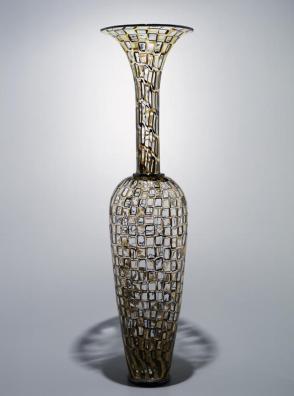 Yellow and black mosaic vase