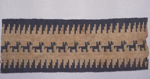 Textile fragment with blue llamas