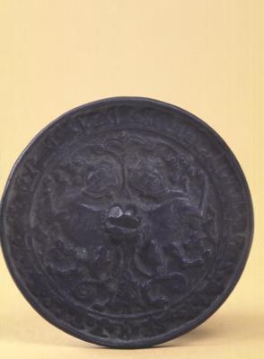 Bronze mirror:  Sphinxes