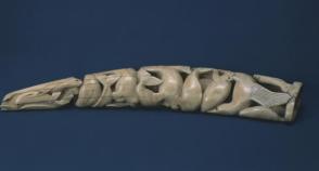 Carved ivory tusk; sea gull, seals, walruses