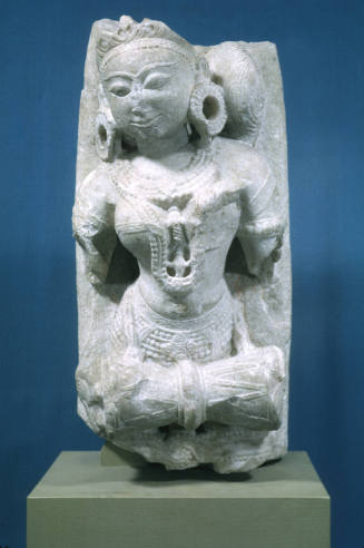 Female Musician playing a Drum