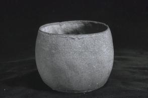 Pottery cup; roller pattern imprint