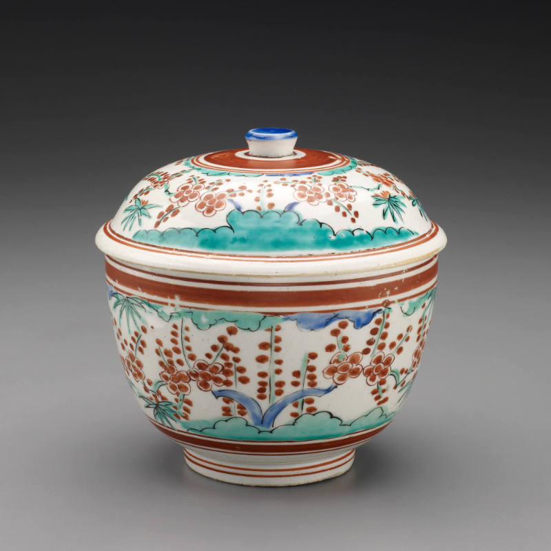 Covered bowl with plum design