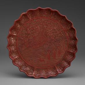 Dish with foliated rim, illustrating Shou Lao flying in landscape