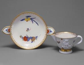 Cup and double-handled saucer