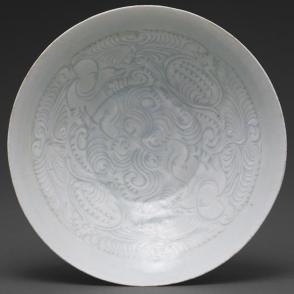Bowl with boys among pomegranate scrolls