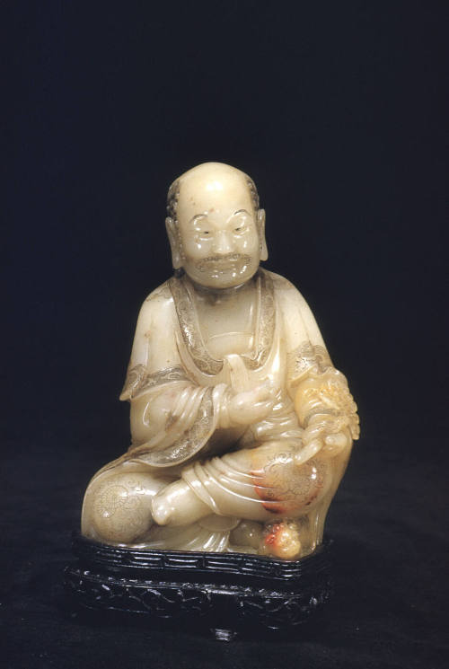 Lohan, seated