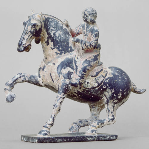 Black stone horse and rider