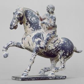 Black stone horse and rider