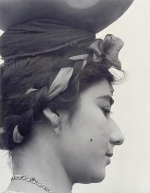 Close-up of a girl from Espinal—she carries a water pot on her head, from Amero Picture Book