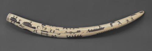Ivory tusk:  engraved hunting scenes