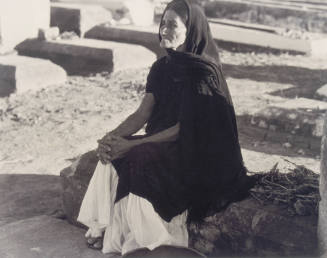 And towards the end—on the “day of the dead”—she comes to pray at his tomb, from Amero Picture Book