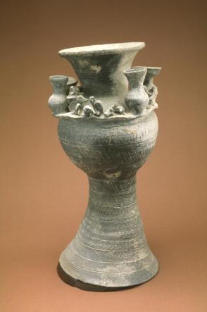 Sue ware vase with figures and cups