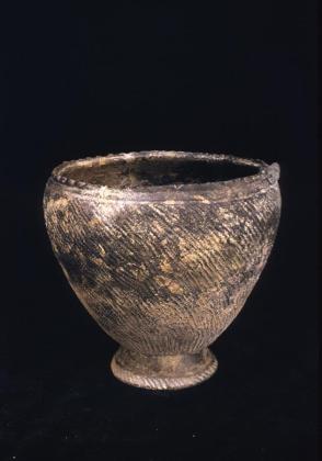 Jomon type vase with cord impressed decoration