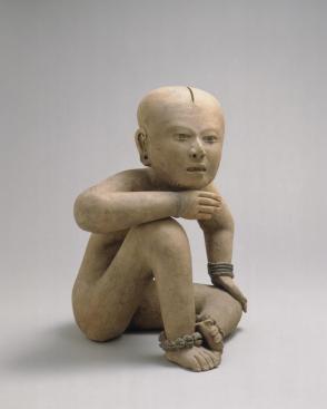 Seated figure