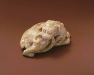 Recumbent animal figure