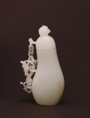 Vase with bird cover